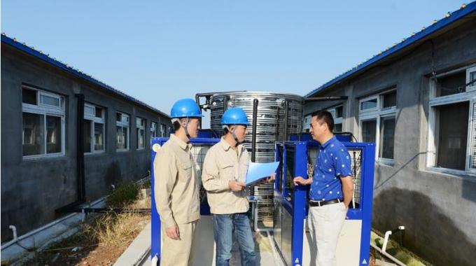 空氣源熱泵供暖養(yǎng)豬示范點送電成功